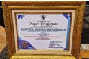 Piagam penghargaan yang diterima Pemkab Pamekasan di ajang Inotek Award 2025 (foto: istimewa) 