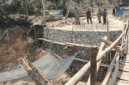 Dandim 0827/Sumenep Letkol Inf Citra Persada, meninjau perkembangan proyek pembangunan jembatan blimbing. (Foto: Istimewa)
